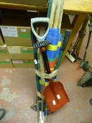 Bundle of Tools Including Shovel, Fork, Windbreak,