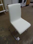 *Four White Polyurethane Chairs