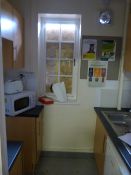 *Contents of Pantry C122; Microwave, Toaster, Unde