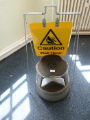 *Kick Step and a Wet Floor Sign