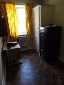 *The Contents of Room A019; Single Pedestal Desk,