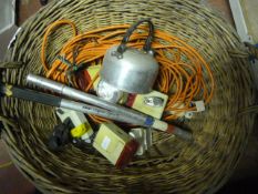 Log Basket Containing Bike Pumps, Bike Lights, etc