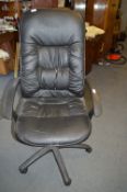 Black Vinyl Upholstered Swivel Office Armchair