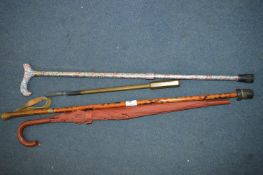 Two Walking Canes, Brass Poker and a Umbrella
