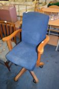 Pine Framed Blue Upholstered Swivel Armchair