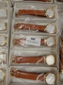 Box Containing 10 Ladies Fashion Watches with Tan