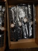 Box Containing 10 Wristwatches with Roulette Wheel