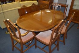 Mahogany Inlaid Extending Oval Dining Table with F