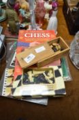 Two Chess Sets and Two Books 