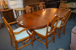 Walnut Oval Extending Dining Table with Four Dinin