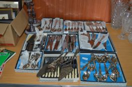 Osborne Silver Plated Cutlery Sets and a Pair of Candlesticks