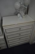 White Melamine Four Height Chest of Drawers