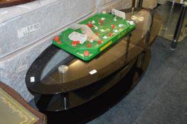 Oval Black Glass Topped TV Unit