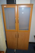 Light Walnut Effect Four Door Cabinet with Frosted