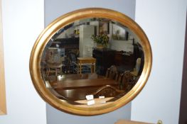 Oval Gilt Framed Bevelled Edge Wall Mirror