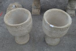 Pair of Reconstituted Limestone Planters on Plinth