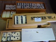 *Seven Boxes of Dominoes