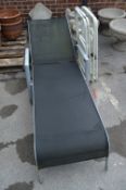 Grey Metal Garden Lounger and Four Folding Metal G