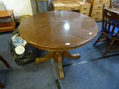 Oak Circular Extending Dining Table on Pedestal Base
