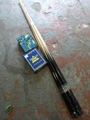 Five Pool Cues and a Box of Chalk