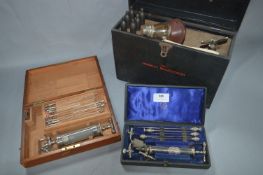 Sparklet Resuscitator and Two Cased Medical Syringe Sets
