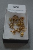 9cT Gold Charm Bracelet - Approx 18.4g