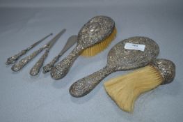 Embossed Silver Vanity Brush & Mirror Set with Shoe Tongs, Button Hook, etc - Birmingham 1912