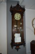 Walnut Cased Twin Weight Pendulum Wall Clock