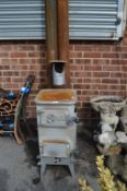 Metal Stove with Flue Pipes
