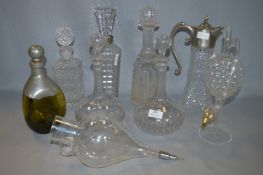 Nine Assorted Cut Glass Decanters and Carafes