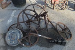 Selection of Farming Cast Iron Wheels and Named Wall Support Plate 