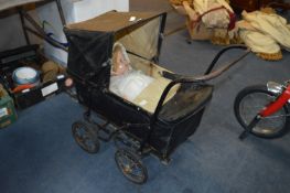 Edwardian Rexine Bodied Pram with Composition Body Doll