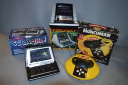 Three 1970's Grandstand Electronic Games - Firefox F7, Scramble and Munch Man