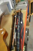 Collection of Walking Canes and Umbrellas