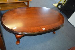 Walnut Veneered Oval Topped Coffee Table on Cabrio