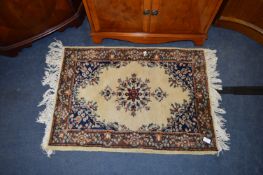 Small Brown Patterned Rug