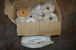 Box Containing Spools of Elastic Curtain Over Fold