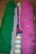 Four Rolls of Assorted Fabrics