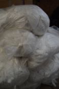 Ten Bags of White Stretch Fabric