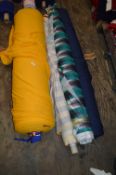 Four Rolls of Assorted Fabrics