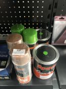 *Four Aerosols and Two Cans of Tractor Paint