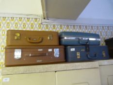 Four Vintage Suitcases