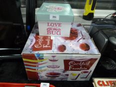 Cocktail Fountain, Ceramic Teapot and a Clothes Ra