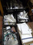 Five Boxes of Plumbing Fittings, Disposable Overalls, etc.