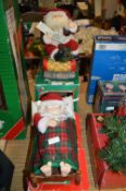 Two Father Christmas Figures