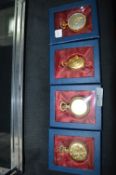 Four Decorative Gilt Metal Pocket Watches