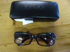 Pair of Gucci Sunglasses