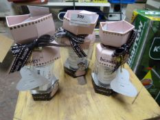 *Three Baylis & Harding Crackers and a Hair Brush