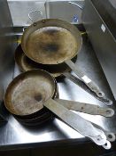 *Seven Assorted Frying Pans