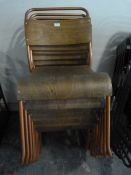 *Nine Copper Coloured Tubular Framed Chairs